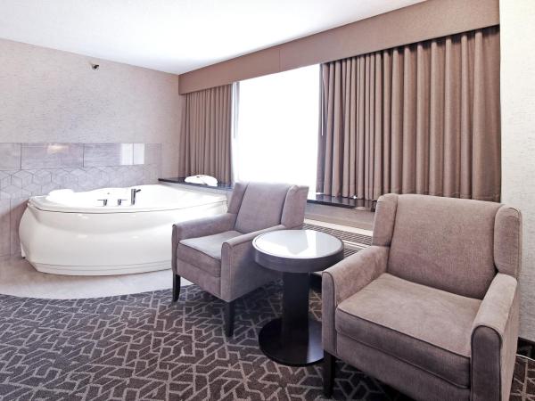 Best Western Plus Siding 29 Lodge : photo 5 de la chambre suite lit king-size avec baignoire spa