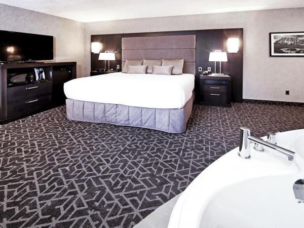 Best Western Plus Siding 29 Lodge : photo 3 de la chambre suite lit king-size avec baignoire spa