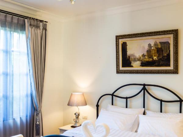Merchant Villa- SHA Extra Plus : photo 5 de la chambre chambre lit king-size deluxe