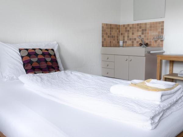 Seminarhotel Romerohaus : photo 2 de la chambre chambre simple avec toilettes et douche communes