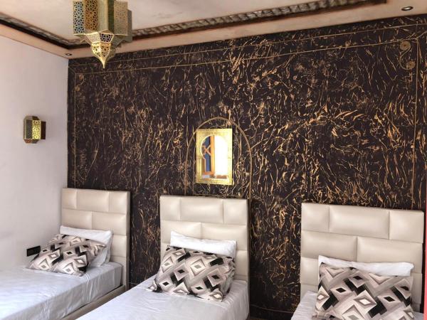 Riad Najiba : photo 3 de la chambre chambre triple