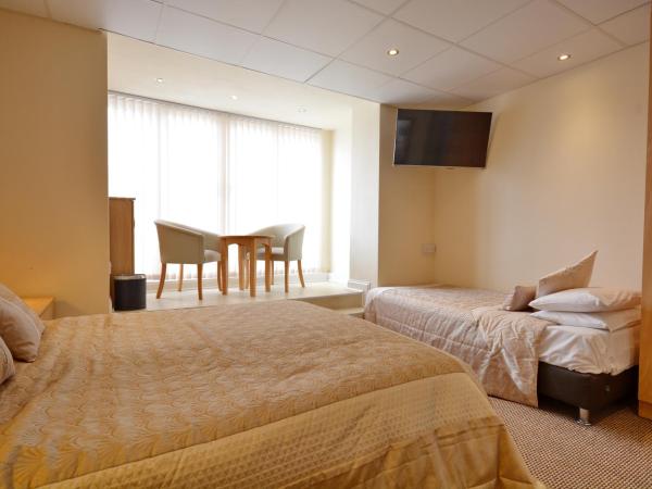 Stuart hotel : photo 2 de la chambre chambre triple avec balcon