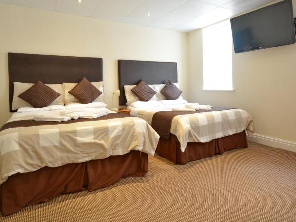 Stuart hotel : photo 3 de la chambre chambre quadruple avec baignoire