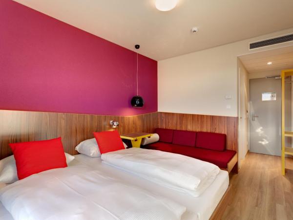 MEININGER Hotel Frankfurt Main / Airport : photo 2 de la chambre chambre triple