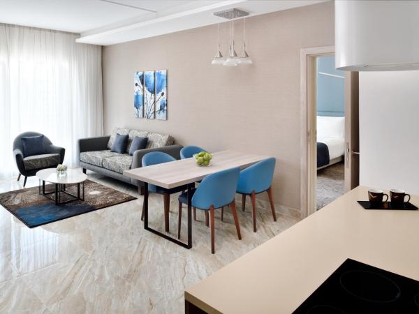 Mövenpick Hotel Apartments Downtown Dubai : photo 6 de la chambre appartement familial communicant 3 chambres