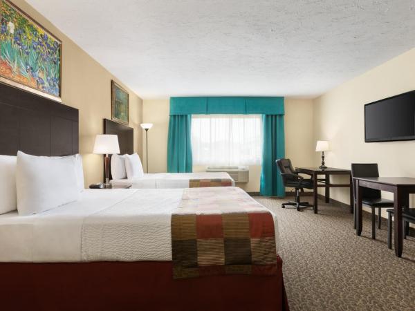 Days Inn by Wyndham Montreal East : photo 4 de la chambre chambre deluxe avec 2 lits queen-size - non-fumeurs