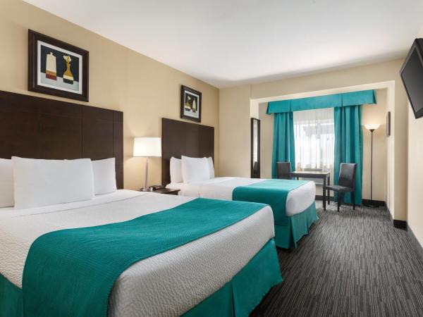 Days Inn by Wyndham Montreal East : photo 4 de la chambre chambre 2 lits queen-size - non-fumeurs