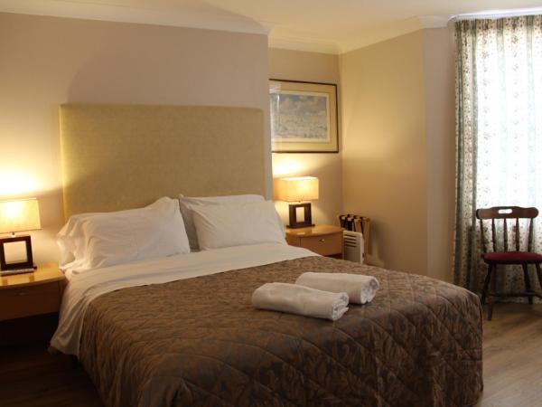 Ambassador Hotel : photo 1 de la chambre chambre double avec salle de bains privative