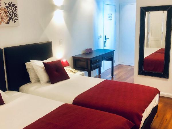 Hotel Botanico de Coimbra : photo 10 de la chambre chambre double ou lits jumeaux
