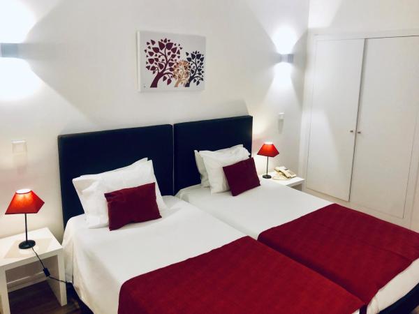 Hotel Botanico de Coimbra : photo 5 de la chambre chambre double ou lits jumeaux