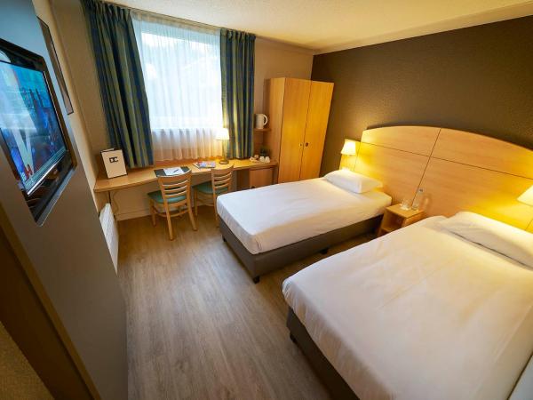 DC Hotel & Restaurant Brussels South : photo 1 de la chambre chambre lits jumeaux