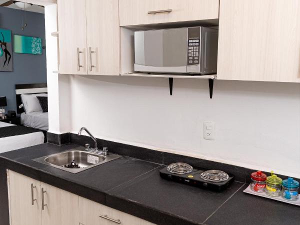 Santa Fe Studios And Suites : photo 2 de la chambre studio avec terrasse