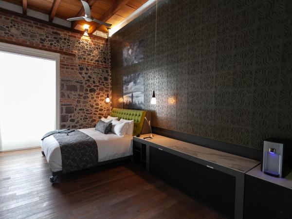 Mumedi Design Hotel : photo 8 de la chambre suite de luxe avec baignoire