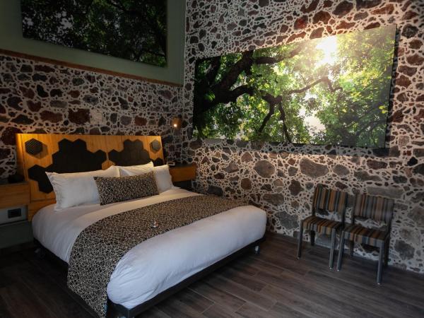 Mumedi Design Hotel : photo 1 de la chambre suite deluxe avec lit king-size