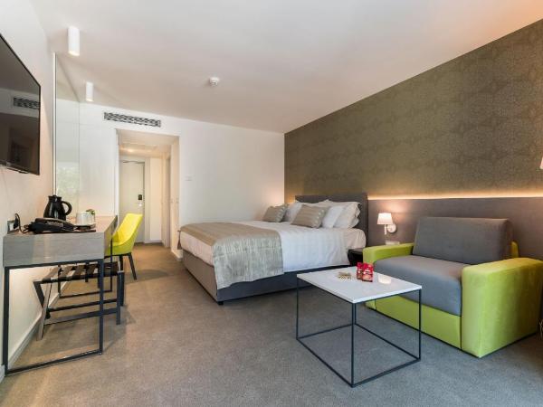 Boutique Hotel Mirjam : photo 9 de la chambre chambre double deluxe avec balcon - vue sur jardin