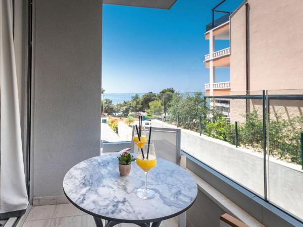 Boutique Hotel Mirjam : photo 1 de la chambre chambre double deluxe avec balcon - vue sur jardin