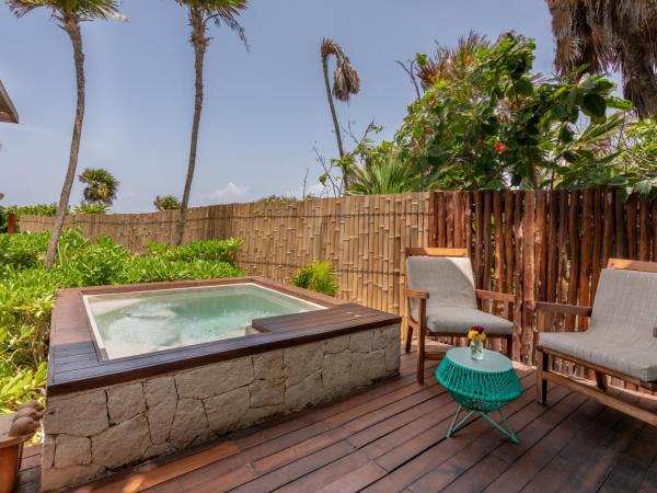 Mi Amor Boutique Hotel-Adults Only : photo 7 de la chambre hébergement avec bain à remous rafraîchissant – vue sur mer