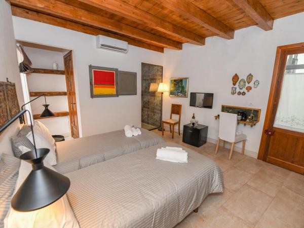 Locanda Sette Fate SPA e Solarium : photo 5 de la chambre chambre double ou lits jumeaux avec salle de bains privative