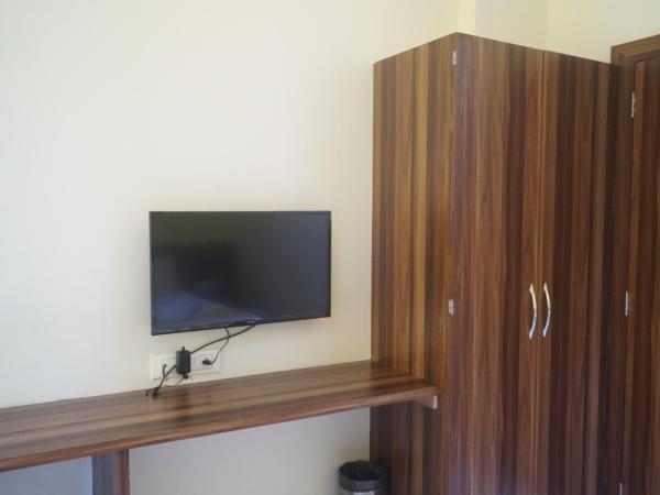 Hotel Sai Sharada : photo 5 de la chambre chambre deluxe