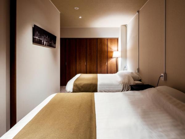 Randor Residence Hiroshima Suites : photo 1 de la chambre suite familiale