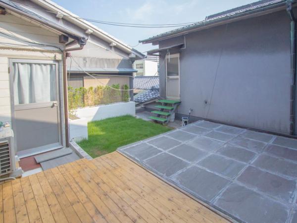 I Osaka Traditional : photo 10 de la chambre chambre familiale - vue sur jardin