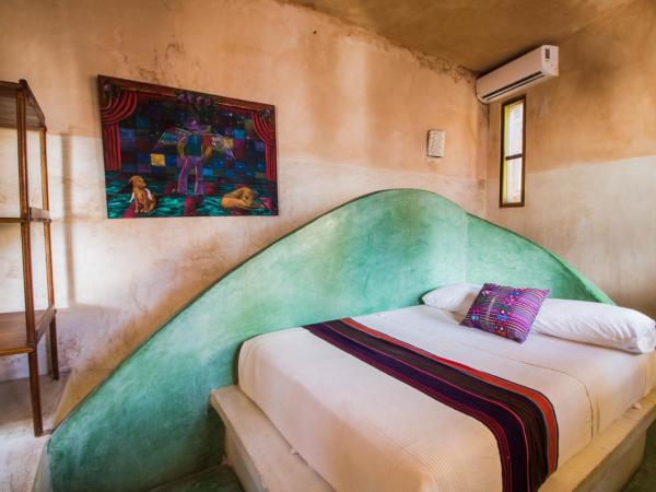 La Posada del Sol Boutique Hotel Tulum : photo 3 de la chambre chambre avec 1 lit king-size et 1 lit double - vue partielle sur océan 