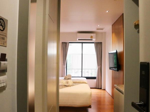 Lanna Thaphae Hotel : photo 7 de la chambre chambre lit king-size ou lits jumeaux supérieure