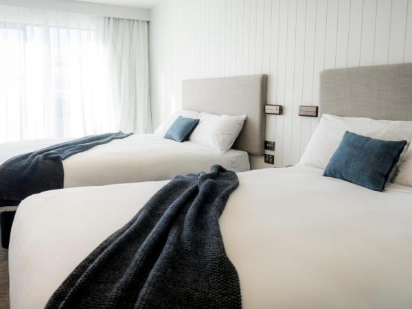 Kamana Lakehouse : photo 3 de la chambre chambre lits jumeaux avec 2 lits queen-size - kamana - vue sur cour