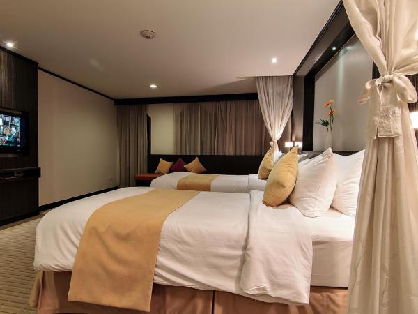 Bossotel Bangkok : photo 7 de la chambre chambre familiale avec 2 lits queen-size