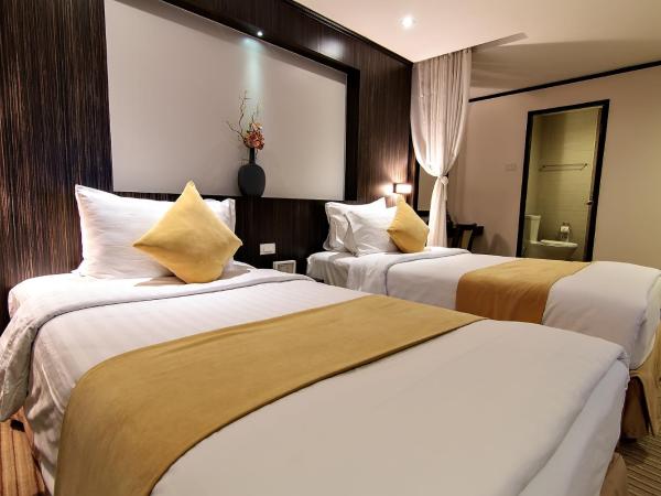 Bossotel Bangkok : photo 4 de la chambre chambre familiale avec 2 lits queen-size