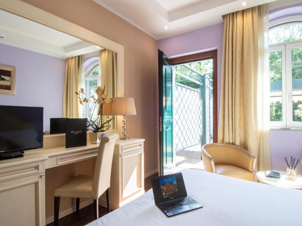 Hotel Silver Milano : photo 5 de la chambre chambre de luxe double ou lits jumeaux avec baignoire spa