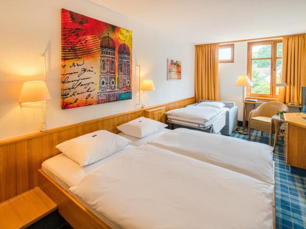Hotel Am Nockherberg : photo 1 de la chambre chambre triple