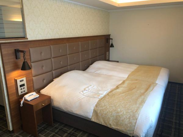 Kobe Luminous Hotel Sannomiya : photo 1 de la chambre chambre lits jumeaux de luxe - non-fumeurs