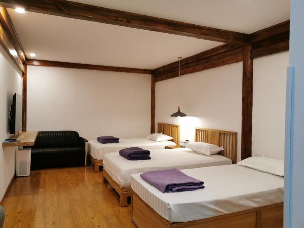 Beijing Downtown Travelotel : photo 6 de la chambre chambre triple de luxe (sans fenêtre)