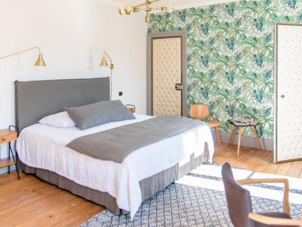 L'esprit du 8 : photo 2 de la chambre chambre lit king-size avec balcon