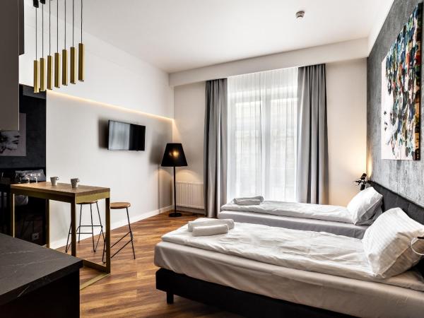 Apartamenty Nowa Kamienica Częstochowa Centrum Szymanowskiego 22A : photo 3 de la chambre appartement standard