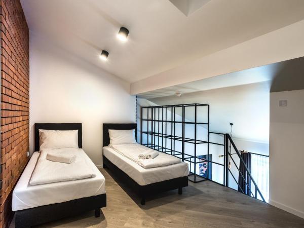 Apartamenty Nowa Kamienica Częstochowa Centrum Szymanowskiego 22A : photo 3 de la chambre appartement en duplex