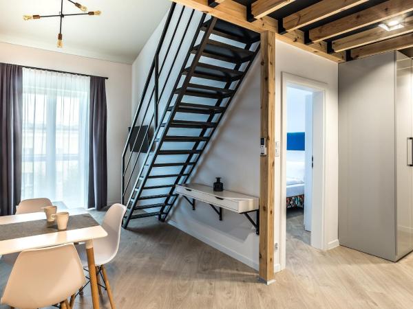 Apartamenty Nowa Kamienica Częstochowa Centrum Szymanowskiego 22A : photo 2 de la chambre appartement en duplex