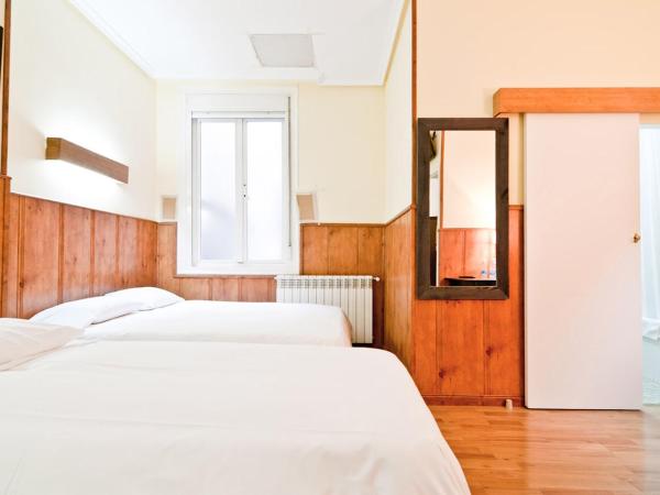 Hostal Asunción : photo 3 de la chambre chambre quadruple