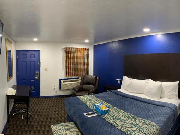 Budget Inn & Suites : photo 5 de la chambre suite lit king-size