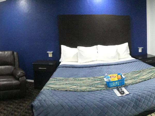 Budget Inn & Suites : photo 6 de la chambre suite lit king-size