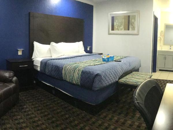 Budget Inn & Suites : photo 7 de la chambre suite lit king-size