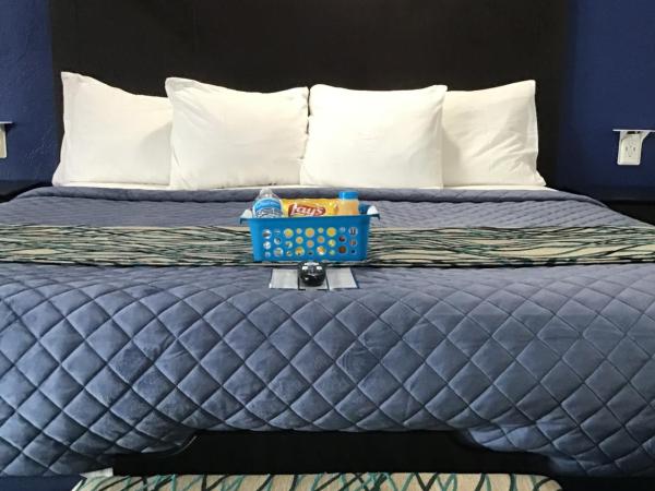 Budget Inn & Suites : photo 2 de la chambre suite lit king-size