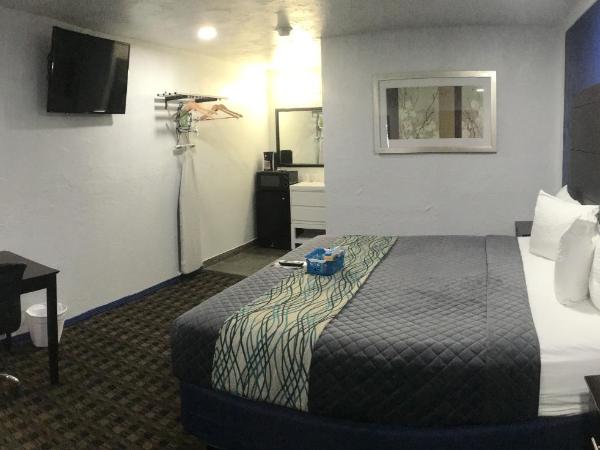 Budget Inn & Suites : photo 8 de la chambre suite lit king-size
