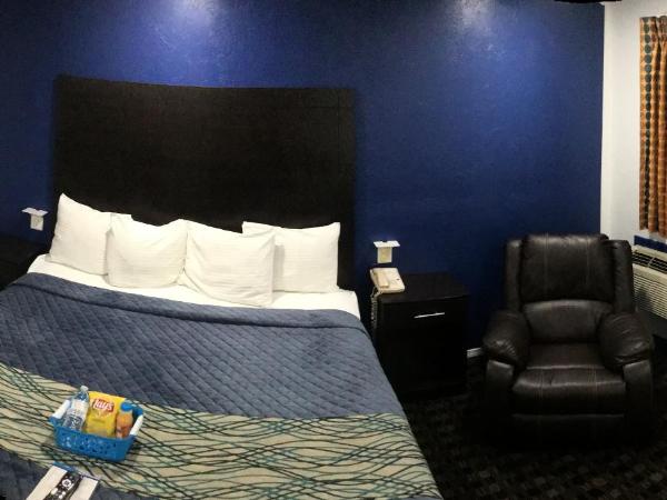 Budget Inn & Suites : photo 9 de la chambre suite lit king-size
