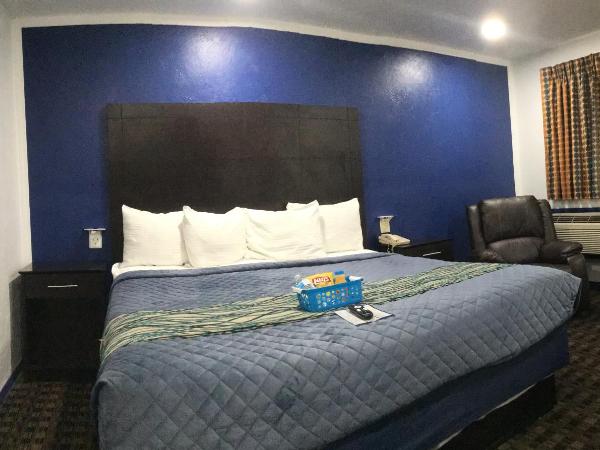 Budget Inn & Suites : photo 4 de la chambre suite lit king-size