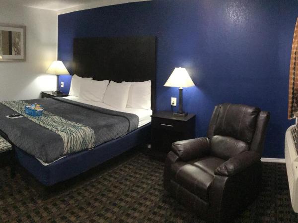 Budget Inn & Suites : photo 10 de la chambre suite lit king-size