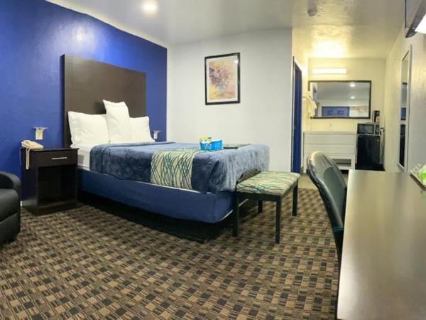 Budget Inn & Suites : photo 4 de la chambre suite lit queen-size deluxe