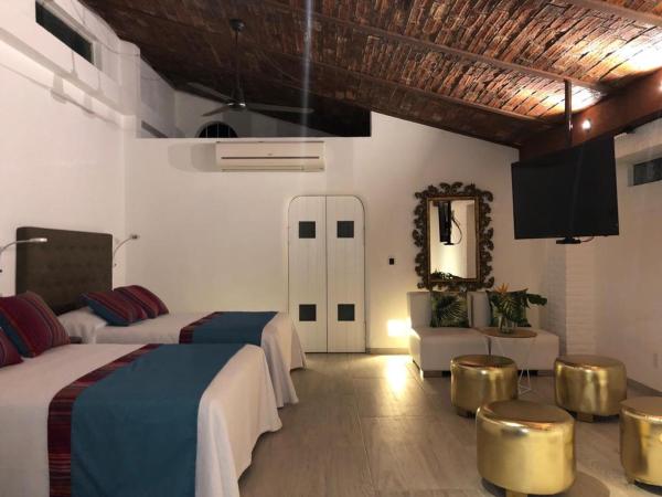 Los Milagros Hotel : photo 1 de la chambre chambre double avec 2 lits doubles