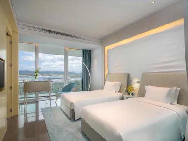 The Mangrovetree Sanya Resort : photo 1 de la chambre chambre double ou lits jumeaux - vue sur lac
